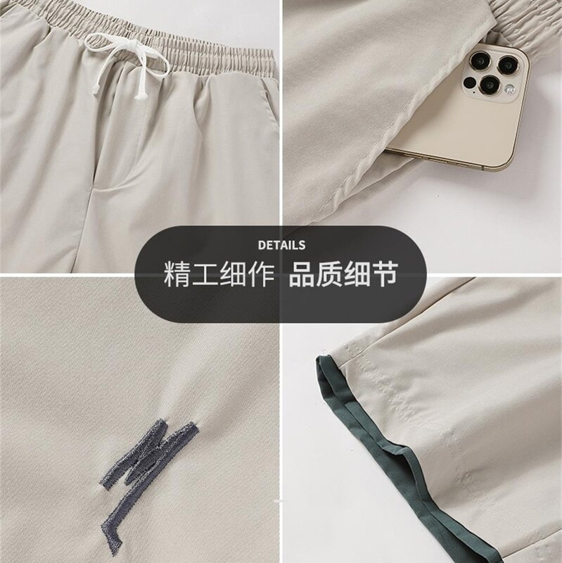 Celana pendek longgar pria, bawahan kain nyaman lembut serut pinggang elastis kasual bernafas olahraga luar ruangan untuk musim panas