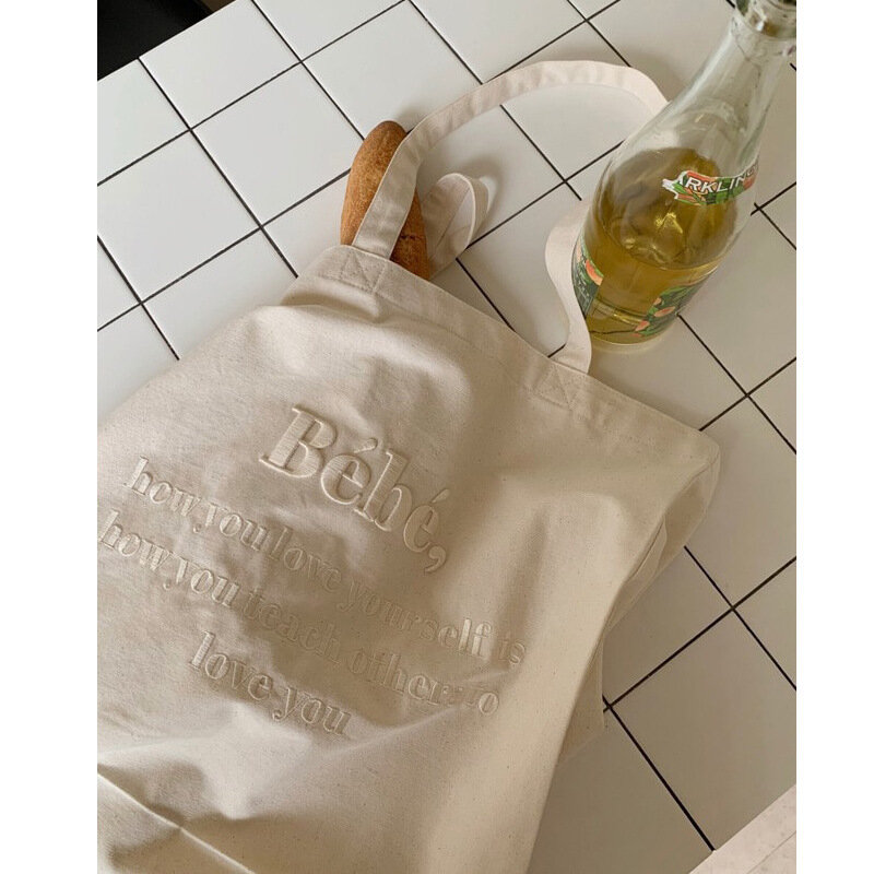 حقيبة يد نسائية جديدة كورية عليها حروف Bebe حقيبة قماشية مطرزة بأشكال إنس قوطية ماركا دراجون أربعة ألوان حقيبة كتف واحدة للطلاب