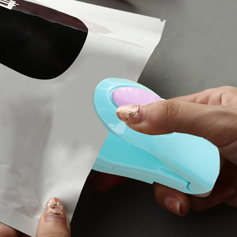 Mini sigillatrice portatile per uso domestico macchina portatile termosigillatrice tappatrice Food Saver per sacchetti di plastica pacchetto gadget da cucina