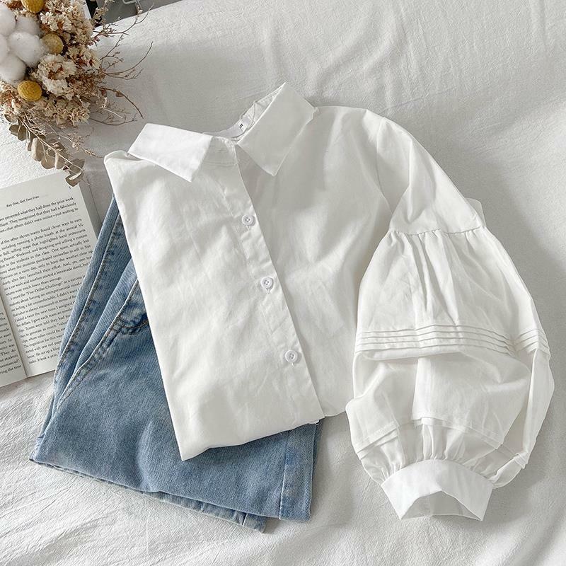Camisa holgada de manga larga para mujer, camisa blanca de retales con cuello de Polo y botones, a la moda, que combina con todo, 2022