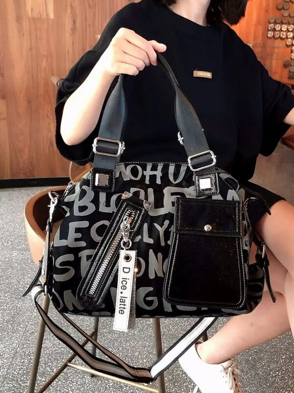 Yilian Damen Tasche neue echte Mode vielseitige große Kapazität schräge Straddle Tasche weiches Leder Handheld Tasche Flut
