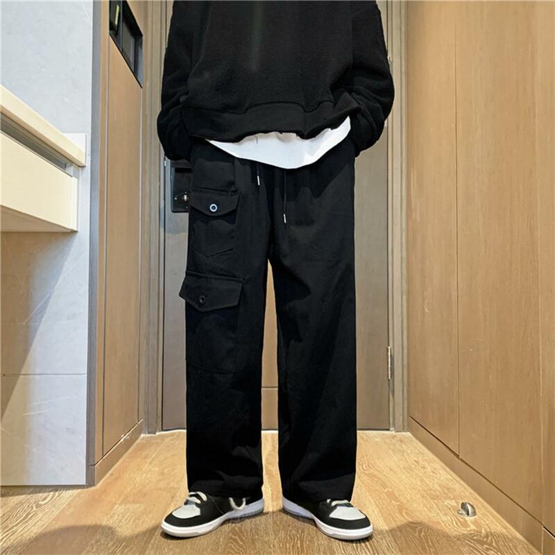 Calças masculinas calças de carga vintage cor sólida multi bolsos calças de perna larga calças streetwear pantalones hombre