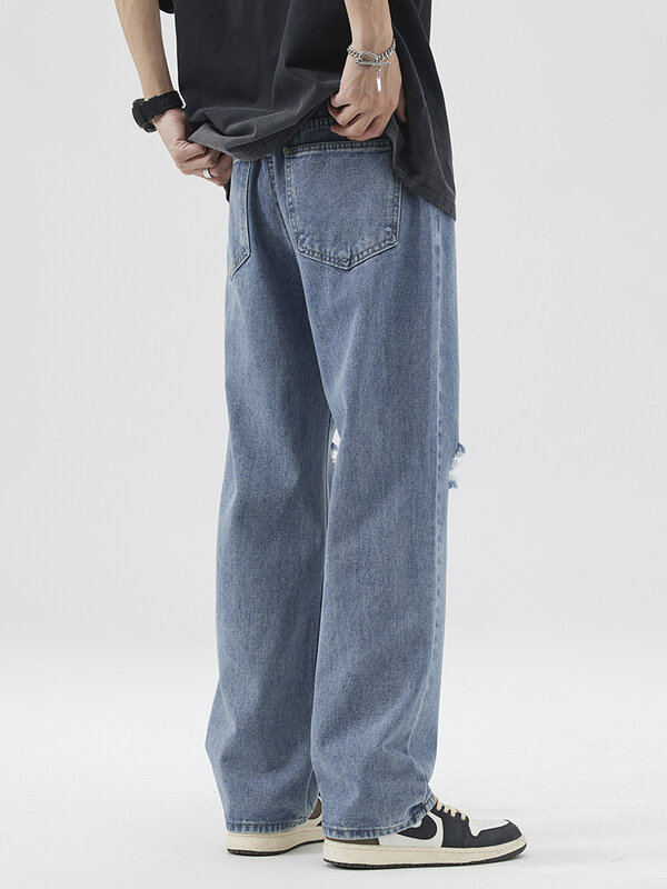 Letnie niebieska z rozcięciami jeansy męskie Streetwear szerokie nogawki proste spodnie dżinsowe Casual z dziurą na kolanie zniszczone bawełniane spodnie workowate dżinsy