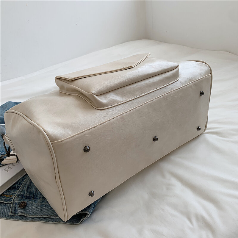 YILIANNew men's and women's large capacity short-haul travel bag fashion large capacity handbag soft leather single shoulder bag