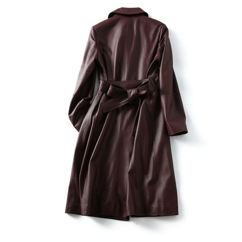 Coat cuts wind from genuine female leather, retro jacket with fine, elegant boxes for office, spring and fall