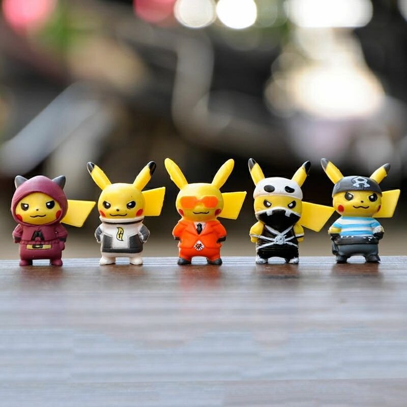 Figuras de acción de Pokémon para niños, 10 piezas con ropa de moda, Pikachu, Bola de elfo, dragón de fuego, Anime, juguete, regalo