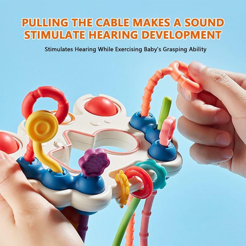 Pull String Toys giocattoli per la dentizione in Silicone per uso alimentare giocattoli per lo sviluppo di abilità motorie fini per i regali di primo compleanno del bambino