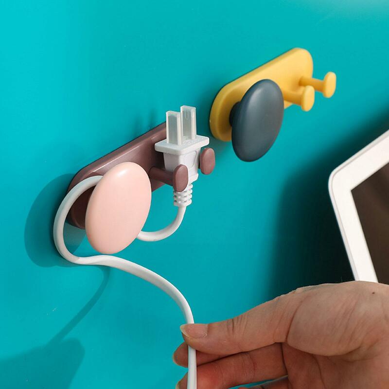 Power Plug Socket Holder Wall-mounted Self-adhesive Receiver Multifunctional Data Hook Earphone Winder Hook Usb Cable Wall J5v2