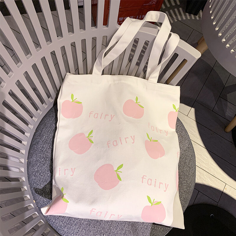 Płótno skrzynki torebki i torebki dla kobiet 2022 moda dziewczyny kobiet kupujących dorywczo nowy Cute Cartoon miód brzoskwinie torba na ramię