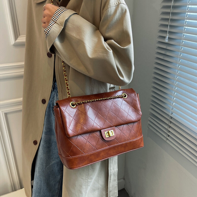 Projektowanie marki damskie torebki na ramię INS moda duża pojemna torba damska kobiece torebki koreański Vintage Hasp PU skórzane torby wiadomości