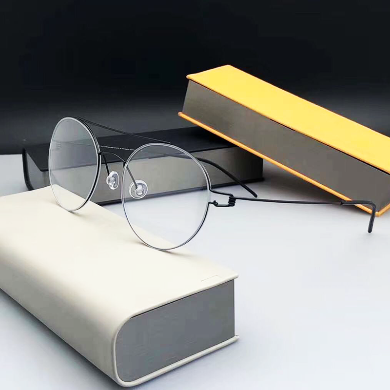 Marco de gafas de titanio para hombre y mujer, gafas ópticas redondas de doble haz para miopía, sin tornillo, graduadas, BRUCE