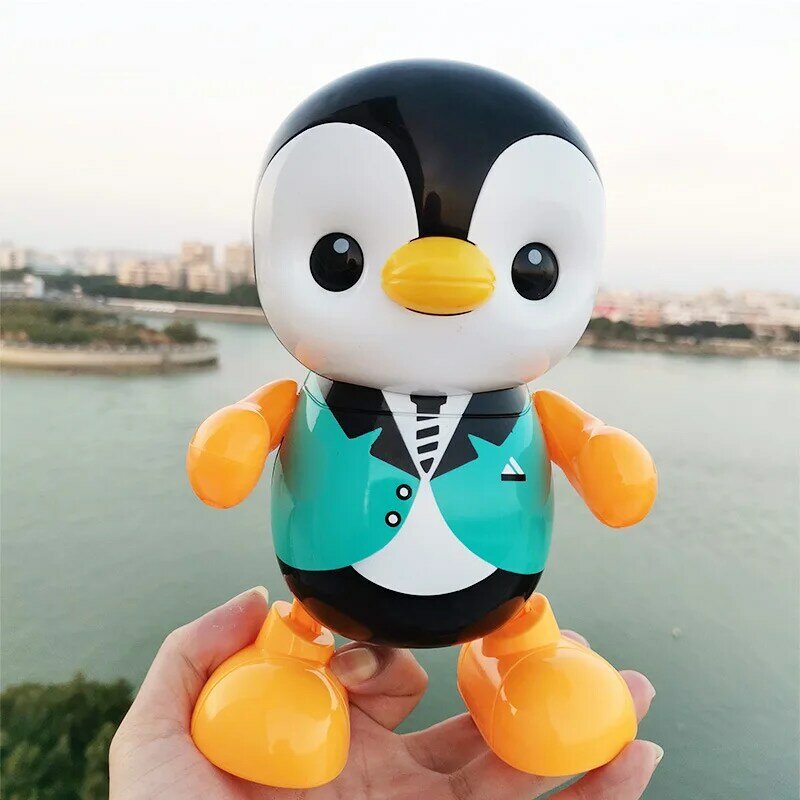 Juguetes de plástico con forma de pingüino para niños, Juguete Musical portátil con luz LED, para cantar