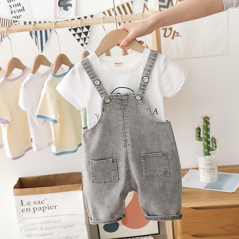 Kombinezon niemowlęcy lato do kolan dżinsy kreskówka maluch chłopiec kombinezony bawełniane szelki Denim Casual dziecięce spodnie chłopięce pajacyki
