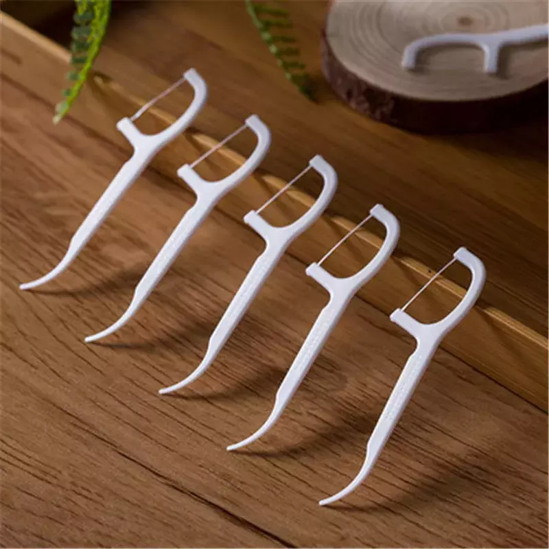 HOT 100pcs/bag Dental Flosser Picks Teeth Stick Tooth Clean Oral cleaning Care Disposable floss thread Toothpicks