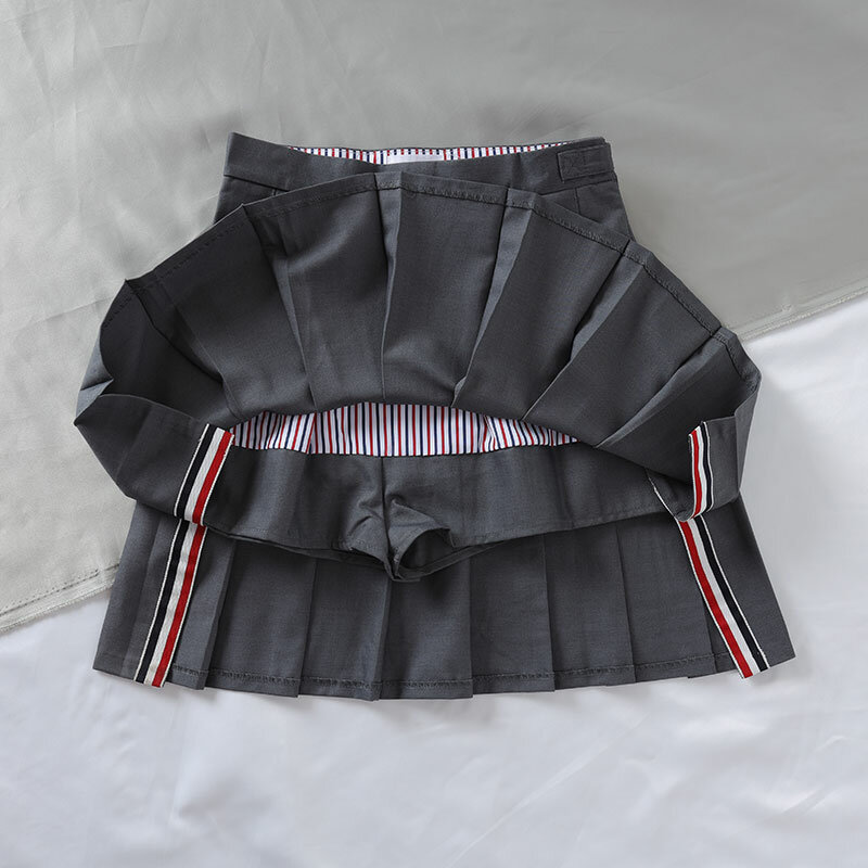 Jupe courte américaine plissée, taille haute, costume mince, matériel, jupe fendue sur le côté