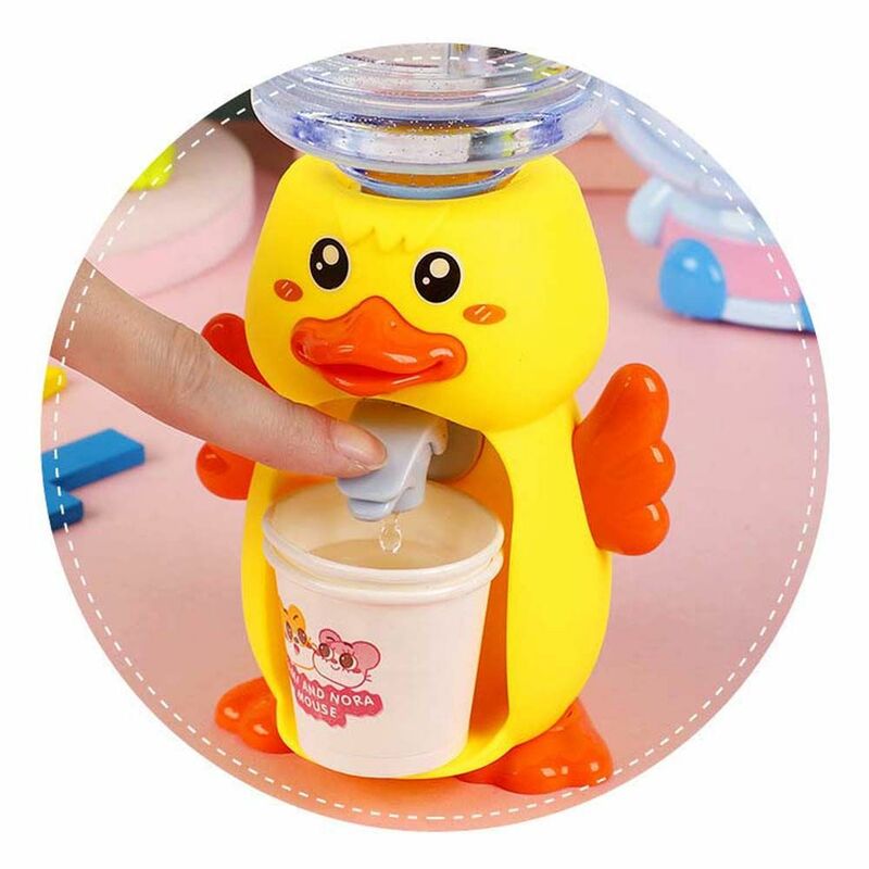 Mini dispensador de agua de dibujos animados para niños, juguete de cocina prensado a mano, puede beber agua Fría/caliente, 1 unidad