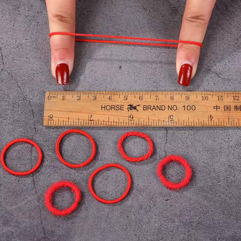 Bandas de goma sin costuras de alta elasticidad para niña, accesorios para el cabello de goma roja, 100 piezas, venta al por mayor