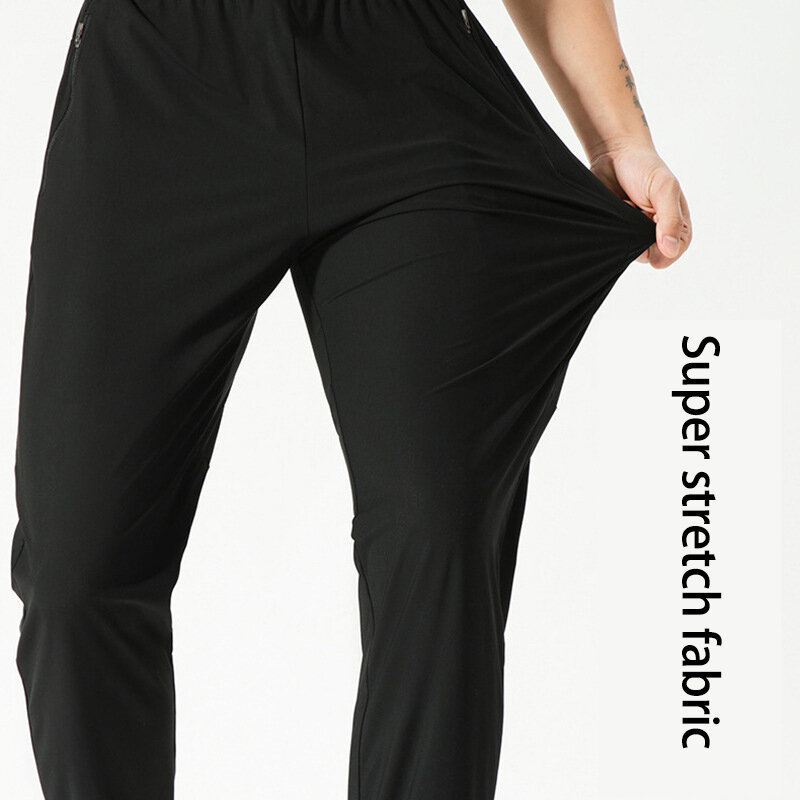 Vuori-Pantalones deportivos de seda de hielo para hombre, pantalón de entrenamiento de gimnasio suelto con cordón, elásticos, de secado rápido, color negro