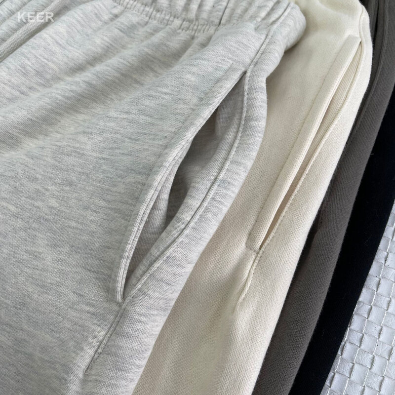 Fw21 Mens Jogging ESSENTIALS กางเกง Jerry Lorenzo Designer พิมพ์ตัวอักษรสะท้อนแสง100% Cotton Hip Hop หลวม Unisex Sweatpants