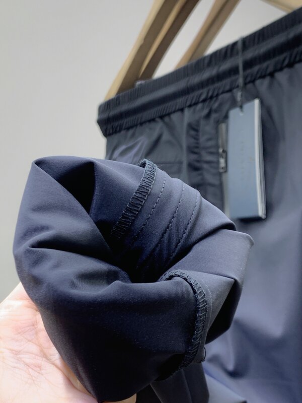 21ss novo design da marca de luxo pràda respirável calças de cintura elástica das mulheres dos homens moda esporte jogger moletom calças ao ar livre